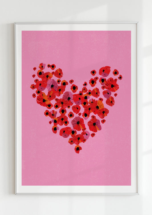 Artistic poster depicting a heart shape filled with red and pink floral patterns on a pink background, framed in a white frame.