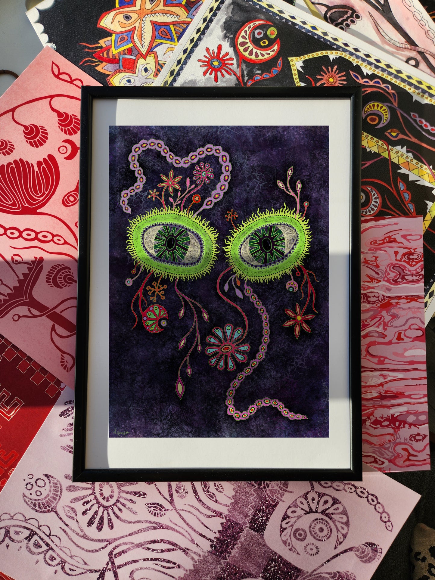 Surreal fantasy wall art poster featuring glowing green abstract eyes on a deep purple background with floral and cosmic details, mystical modern print.