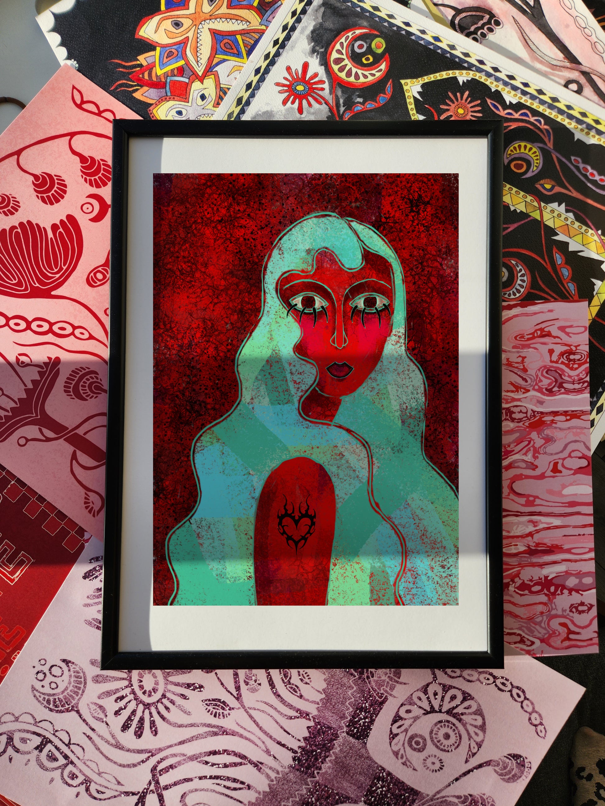 Edgy portrait wall art poster with surreal female figure, bold red and turquoise tones, and symbolic tattoo heart design, modern print.