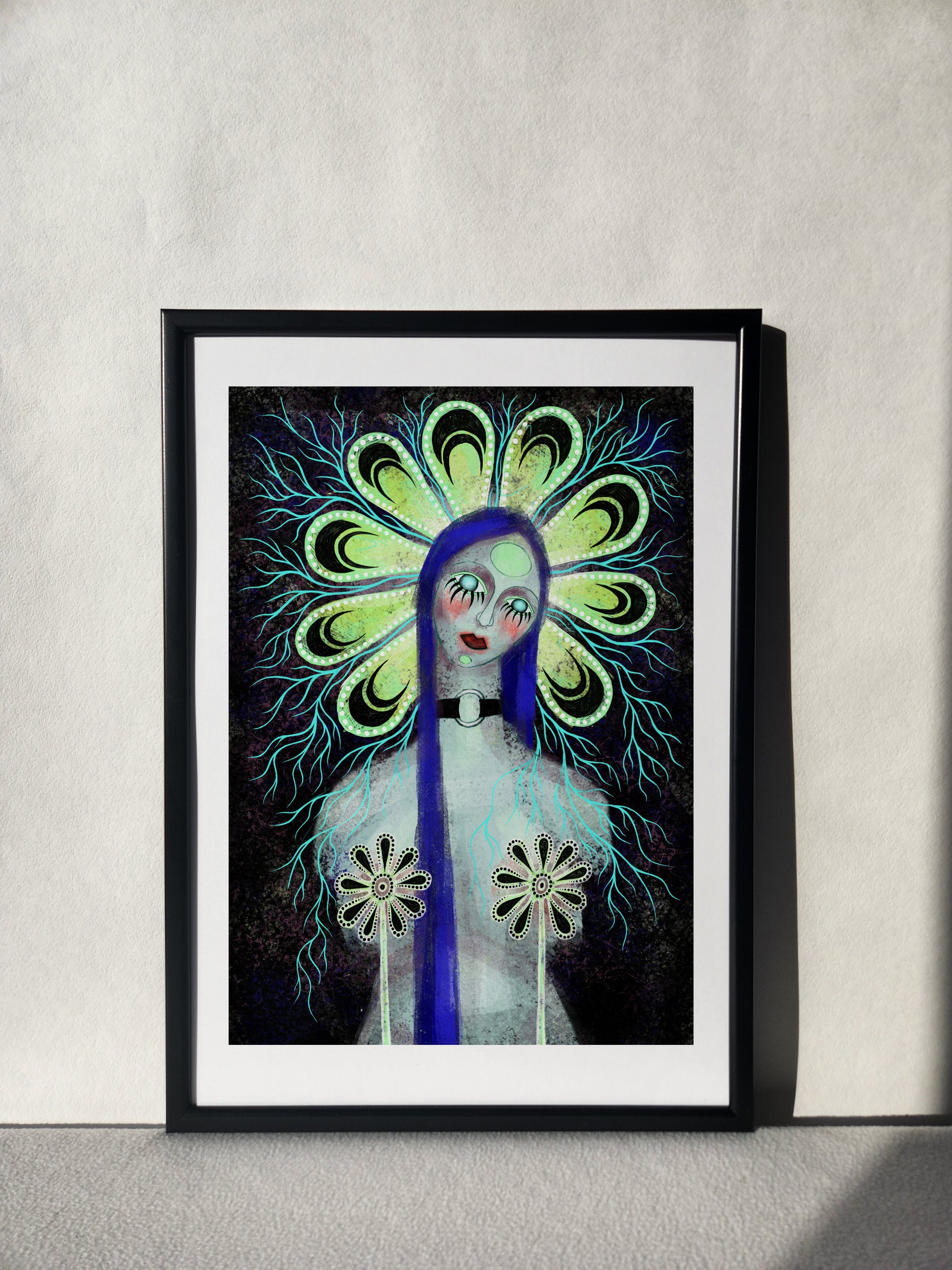 Wall art depicting a surreal female figure with long blue hair, surrounded by a luminous halo of petal-like shapes and adorned with delicate eyelashes and striking red lips