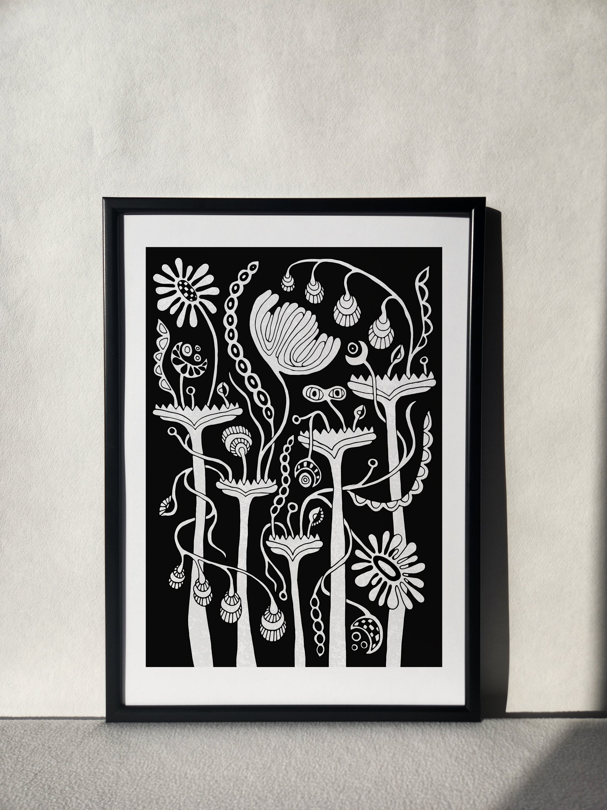 "Botanical wall art in classic black and white tones, perfect for any space."